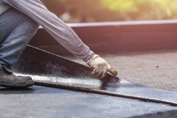 Professional Basement Waterproofing technician working in Hartford, KY